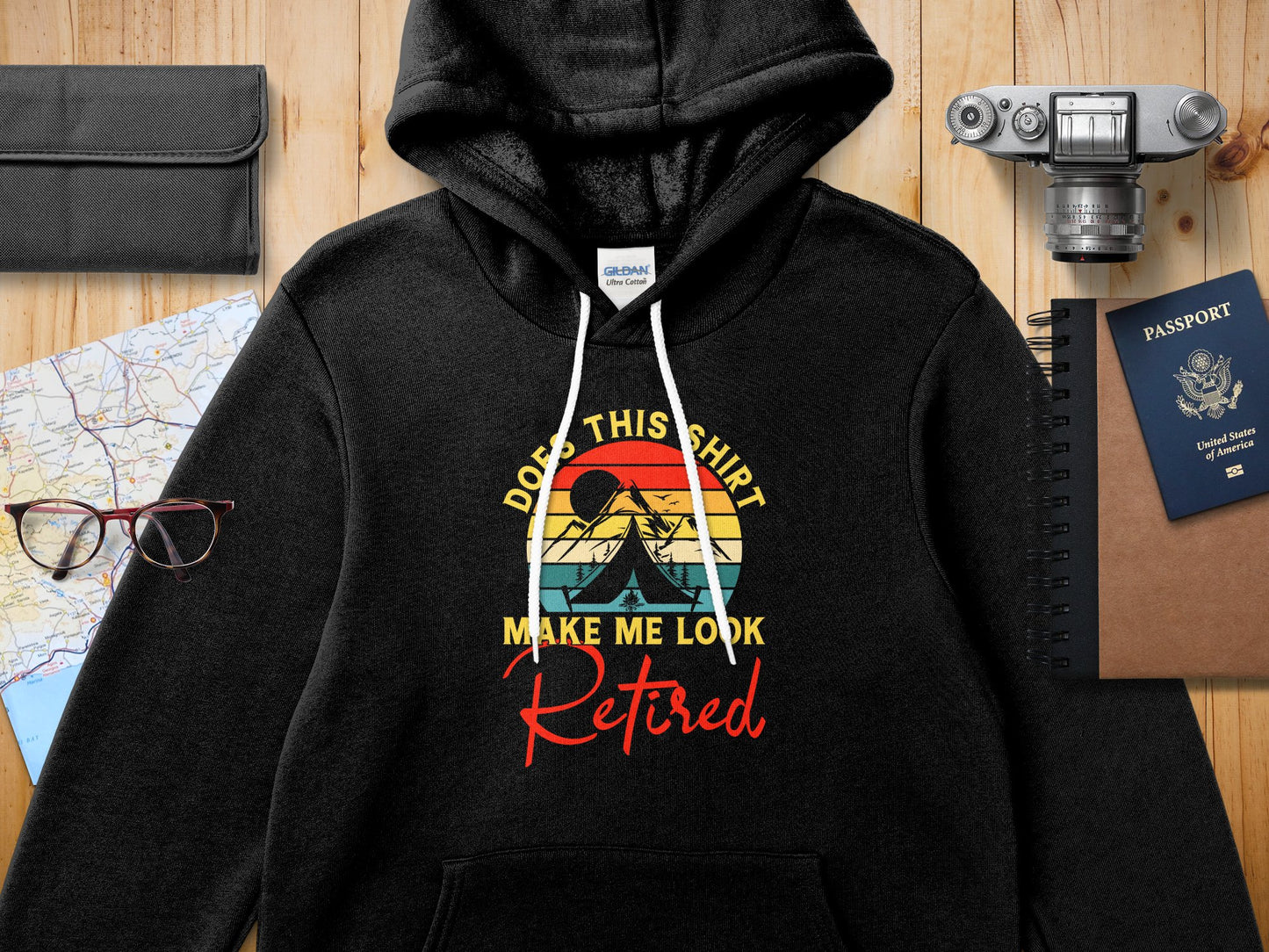 Black Gildan hoodie with text "Does this shirt make me look retired?".