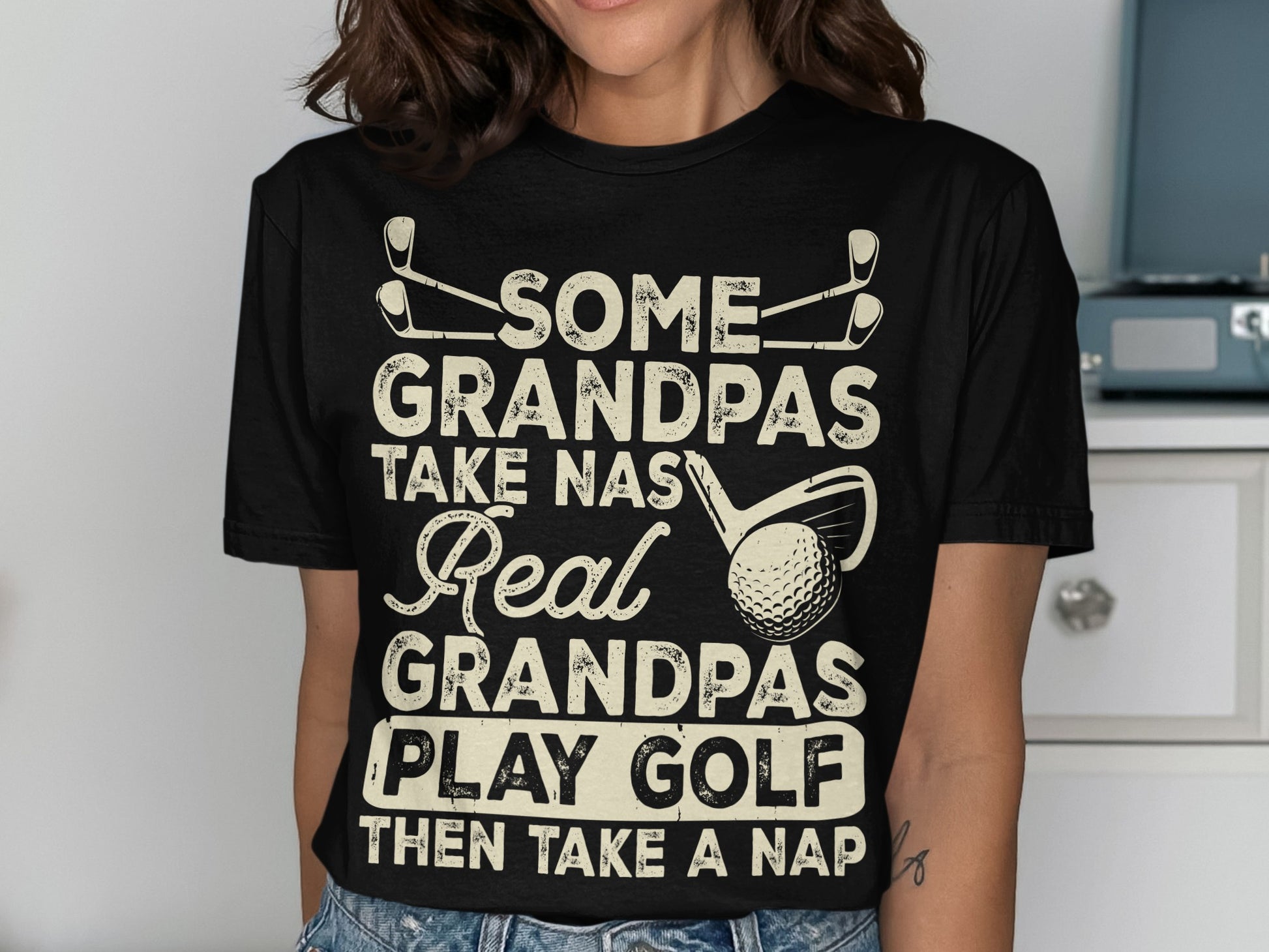 Black t-shirt with text "Some Grandpas Take naps, Real Grandpas Play Golf."