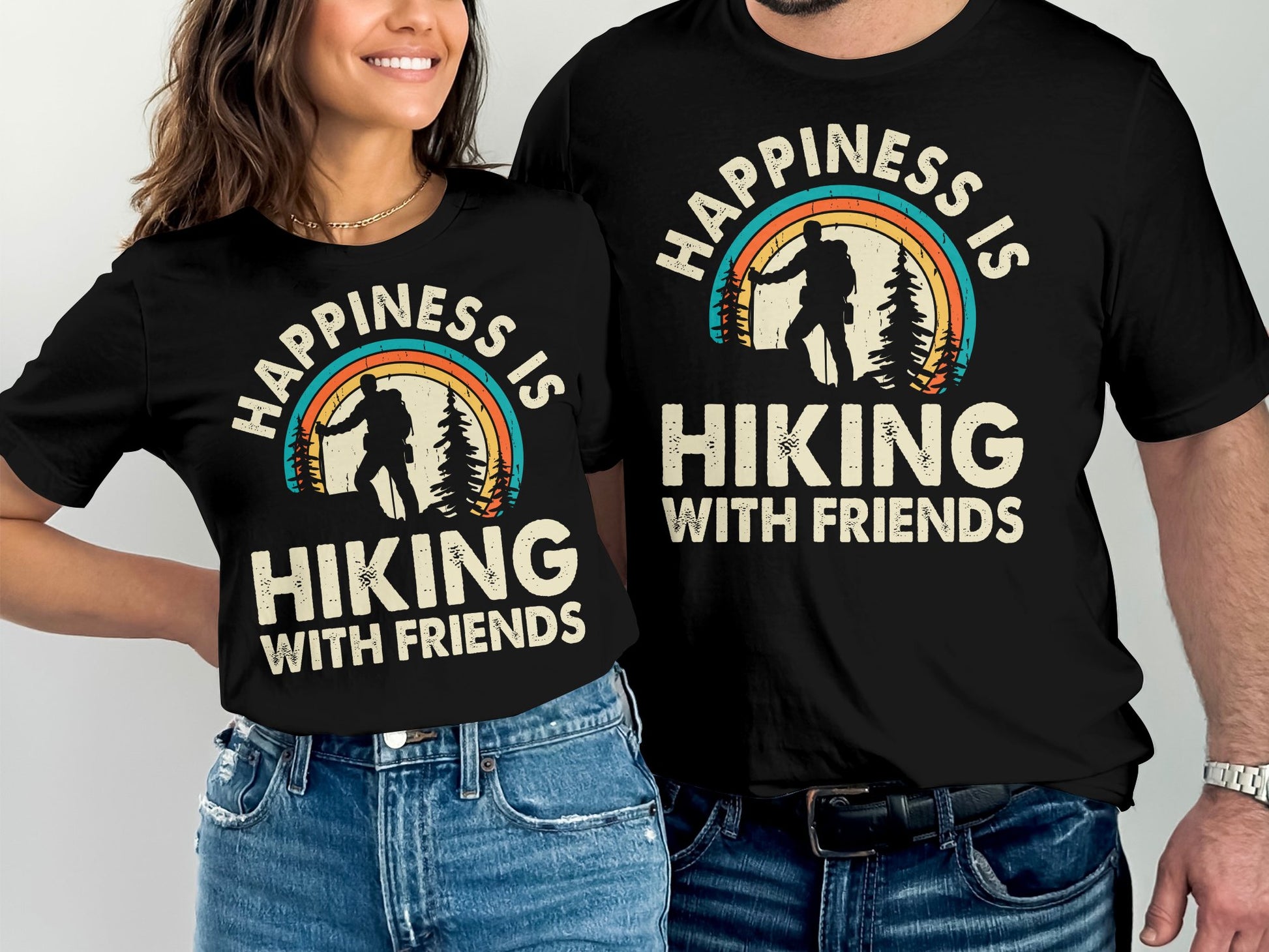 Black t-shirts with "Happiness is Hiking with Friends" and a rainbow mountain graphic.