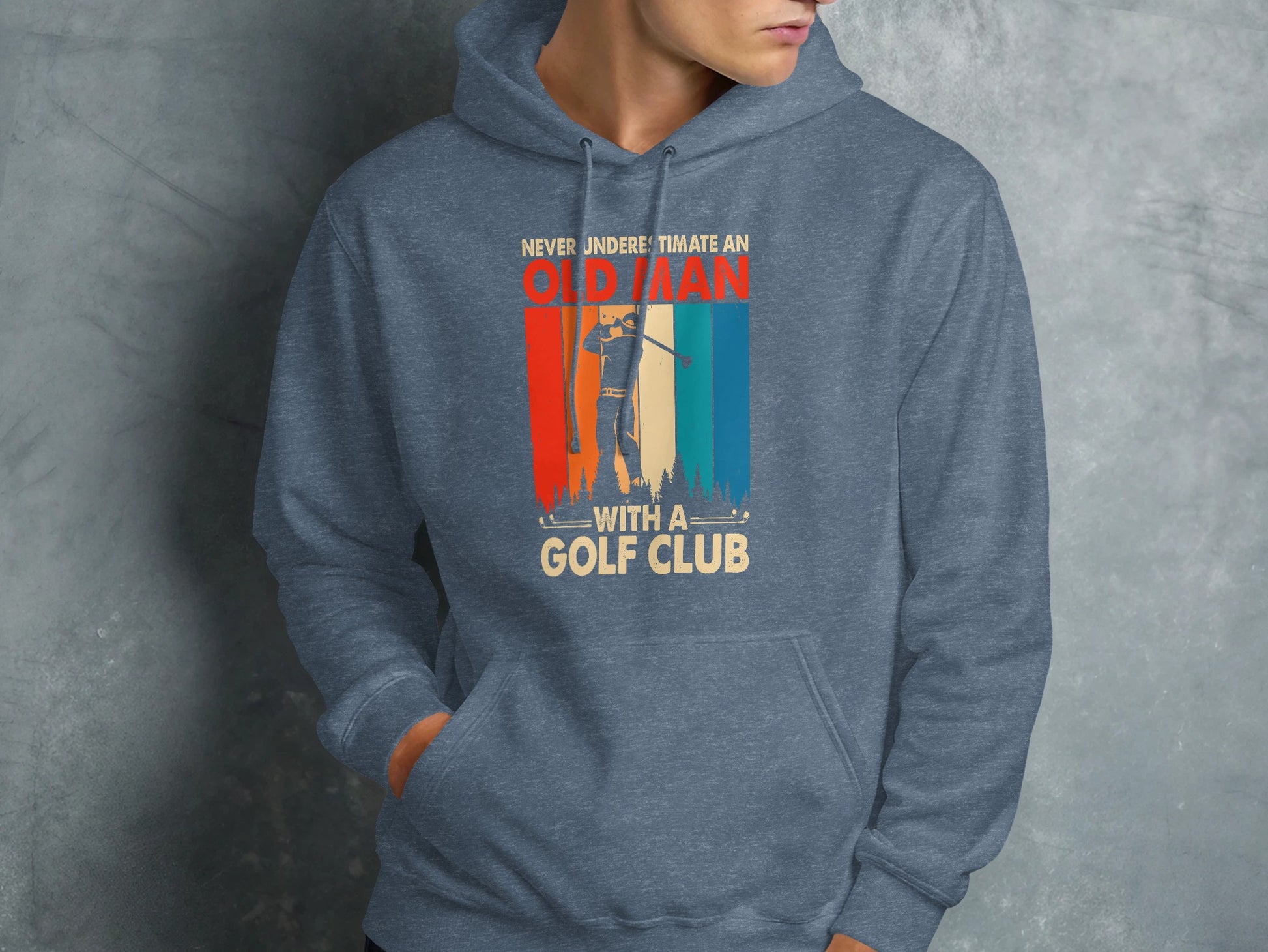 Hoodie with graphic of an old man with a golf club and text.