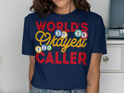 Navy t-shirt with "World's Okayest Caller" and bingo balls.
