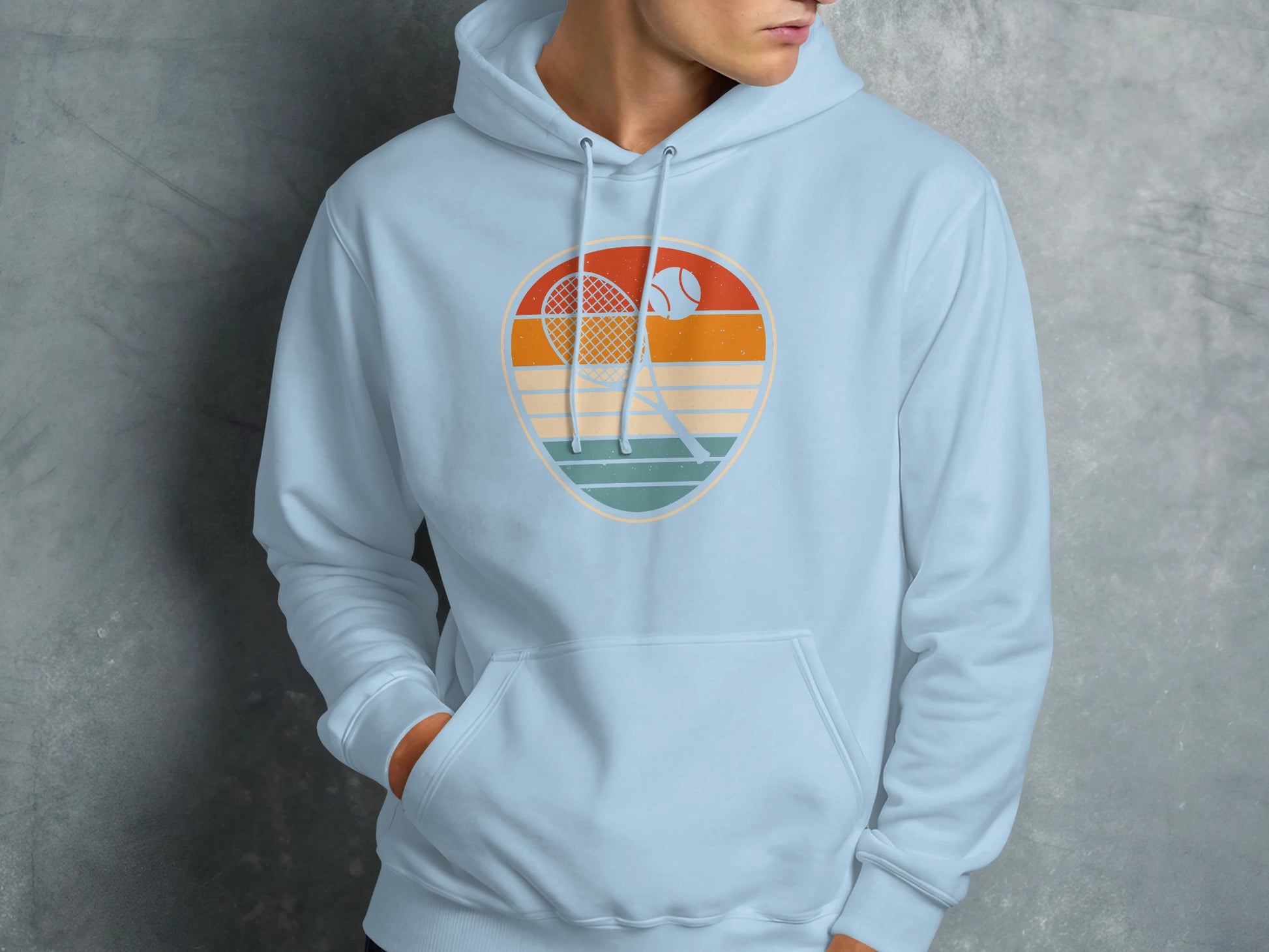 Light blue hoodie with retro tennis graphic on chest.
