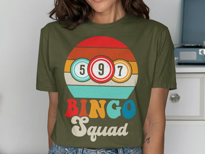 Olive green t-shirt with "BINGO Squad" text and bingo balls.
