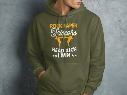 Green hoodie with "Rock Paper Scissors Head Kick I Win" and cartoon figures.