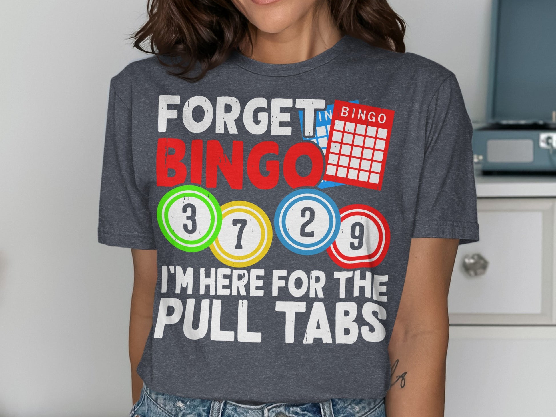 T-shirt with "Forget Bingo, I'm Here for the Pull Tabs" and bingo card graphic.