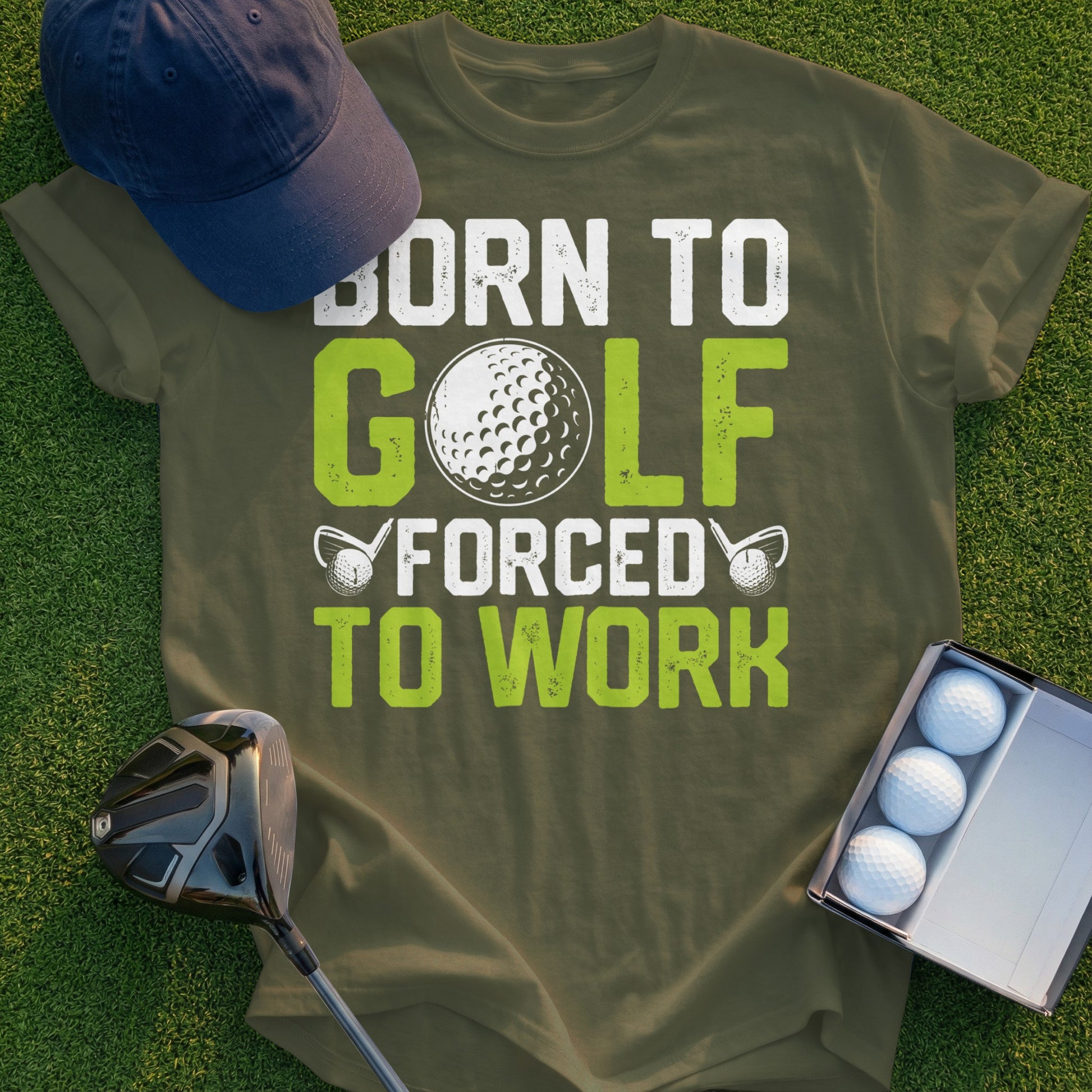 Olive t-shirt with "Born to Golf, Forced to Work" text and golf imagery.