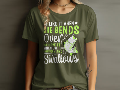 Green t-shirt with text and a cartoon fish catching a worm.