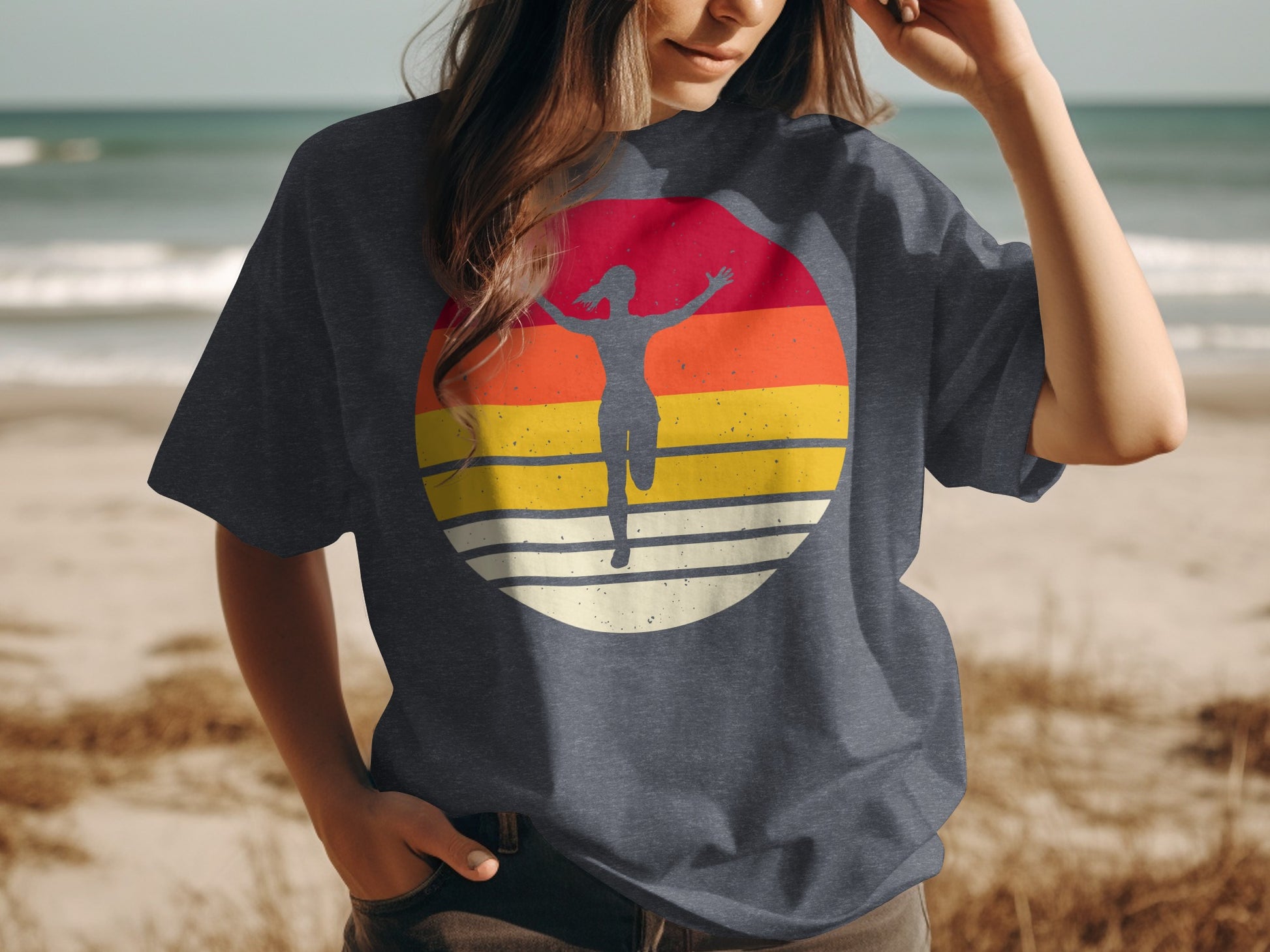 T-shirt with a distressed sunset graphic and a running figure silhouette.