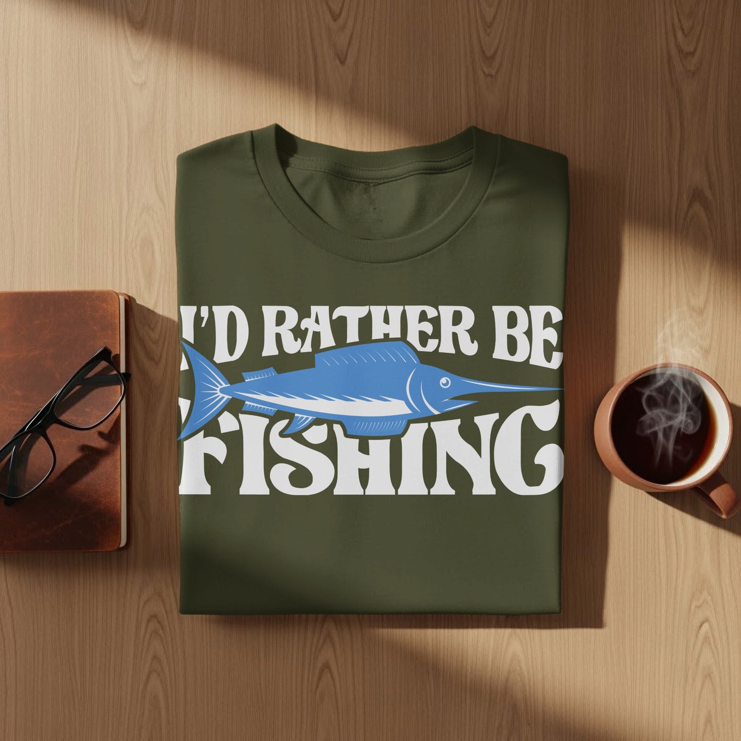 Olive green t-shirt with "I'd Rather Be Fishing" and a marlin graphic.