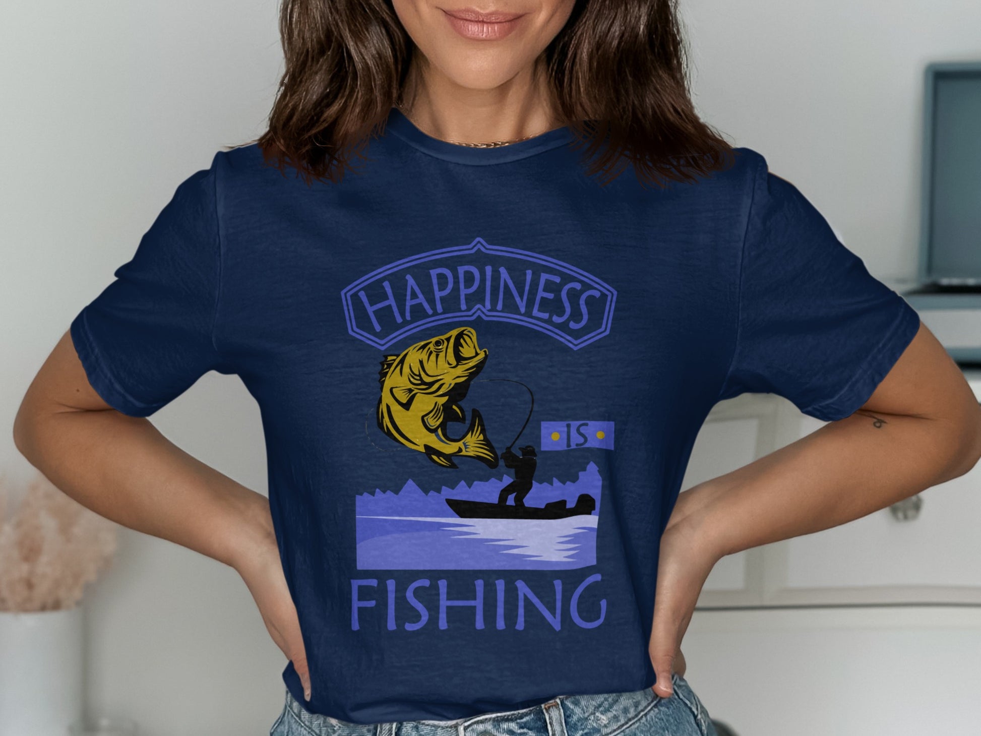 Blue t-shirt with "Happiness Fishing" text, fish, and angler on a boat.