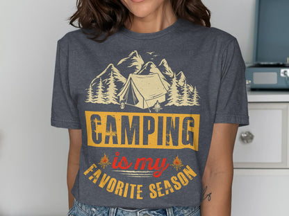 T-shirt with "Camping is my favorite season" text and mountain and tent graphic.