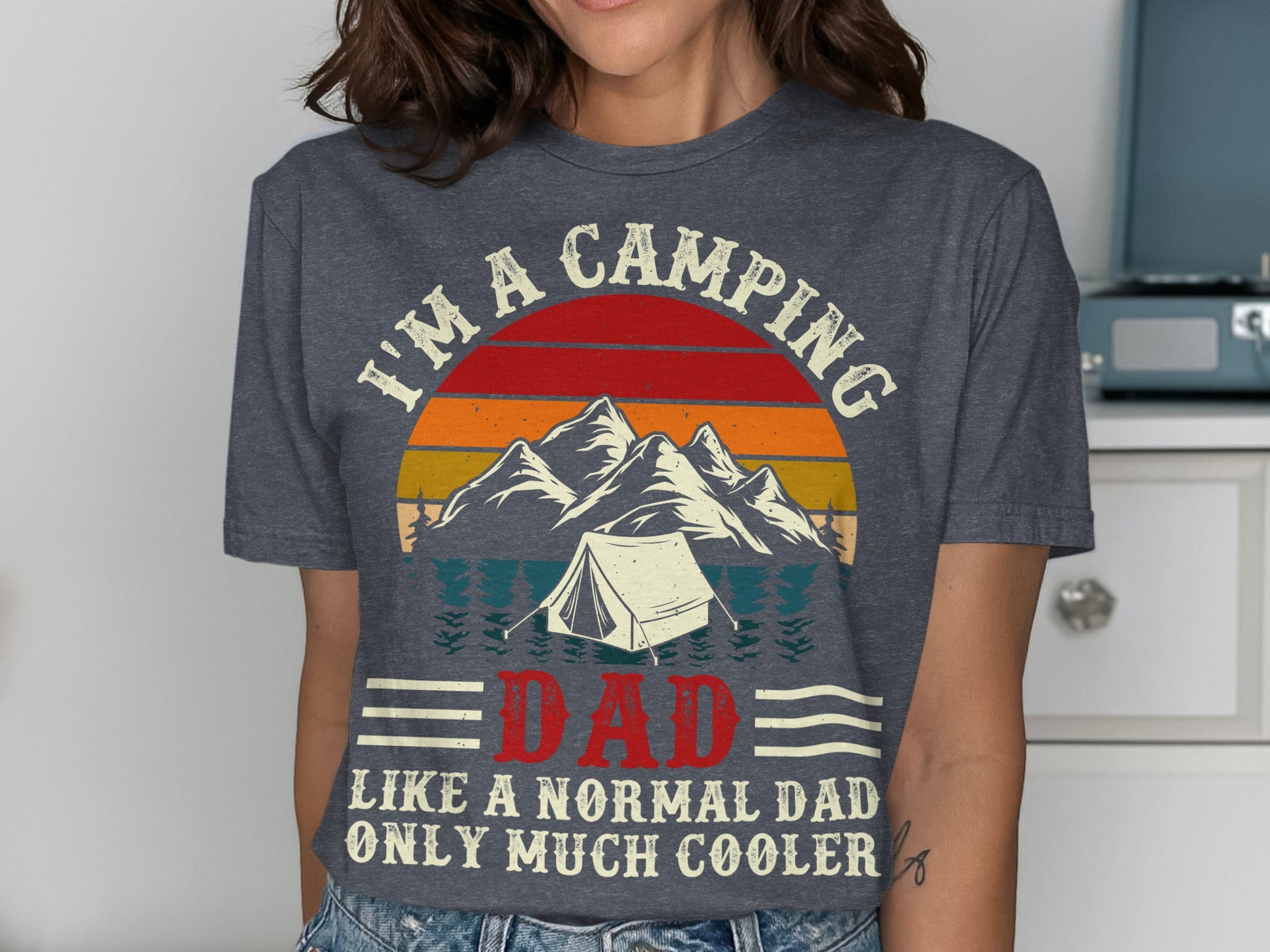 Camping dad t-shirt with tent, mountains, and text.
