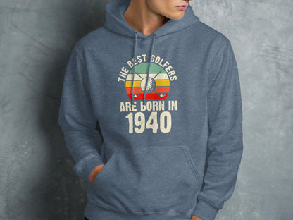Blue hoodie with "The Best Golfers Are Born In 1940" text and golf imagery.