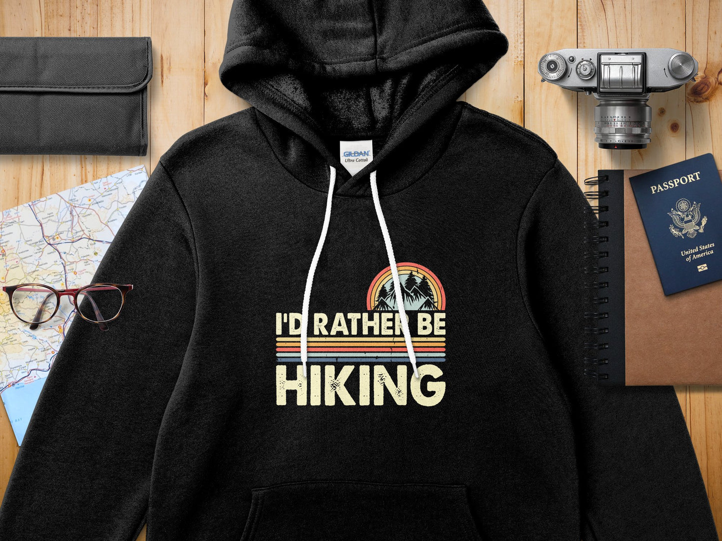 Black hoodie with "I'd Rather Be Hiking" text and mountain graphic.