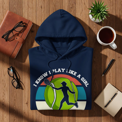 Navy hoodie with "I know I play like a girl" text and tennis player graphic.