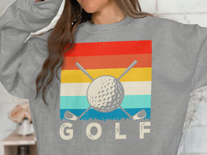 Grey sweatshirt with a retro golf graphic and "GOLF" text.