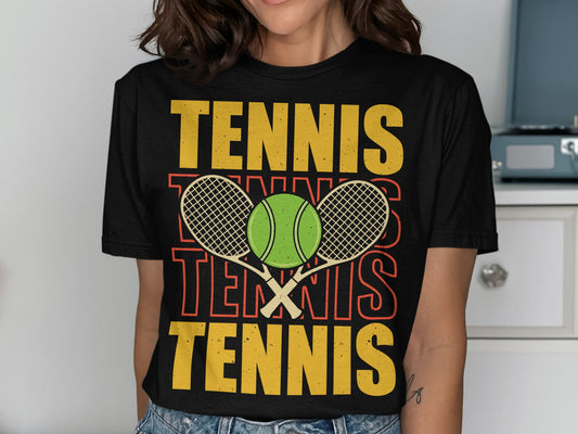 Black t-shirt with "TENNIS" repeated in yellow and orange, and a tennis ball and rackets.