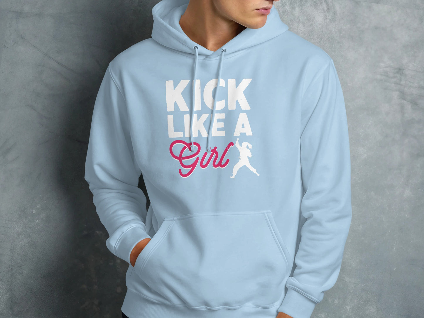 Light blue hoodie with "KICK LIKE A GIRL" in white and pink text with a female runner graphic.