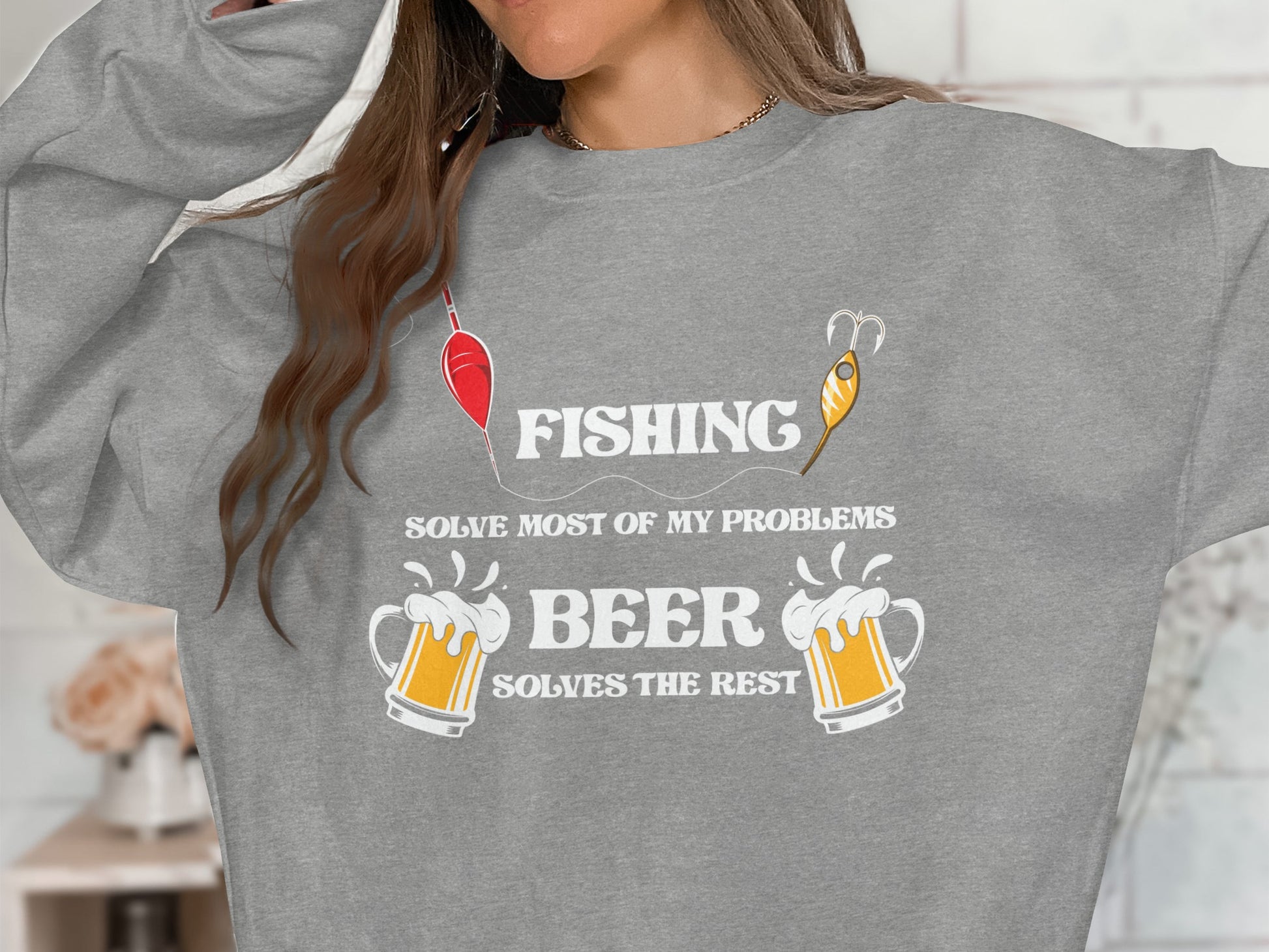 Grey sweatshirt with "FISHING SOLVE MOST OF MY PROBLEMS BEER SOLVES THE REST" text.