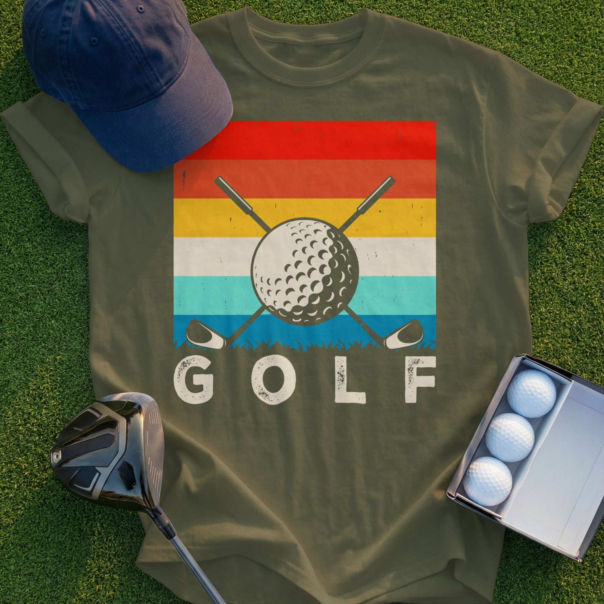 Olive t-shirt with a retro sunset graphic featuring a golf ball and clubs with the word "GOLF".