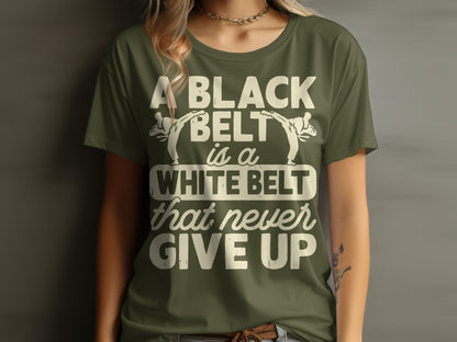 Green t-shirt with white text: "A black belt is a white belt that never give up."