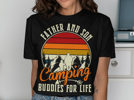 Father and Son Camping Buddies for Life graphic on a black t-shirt.