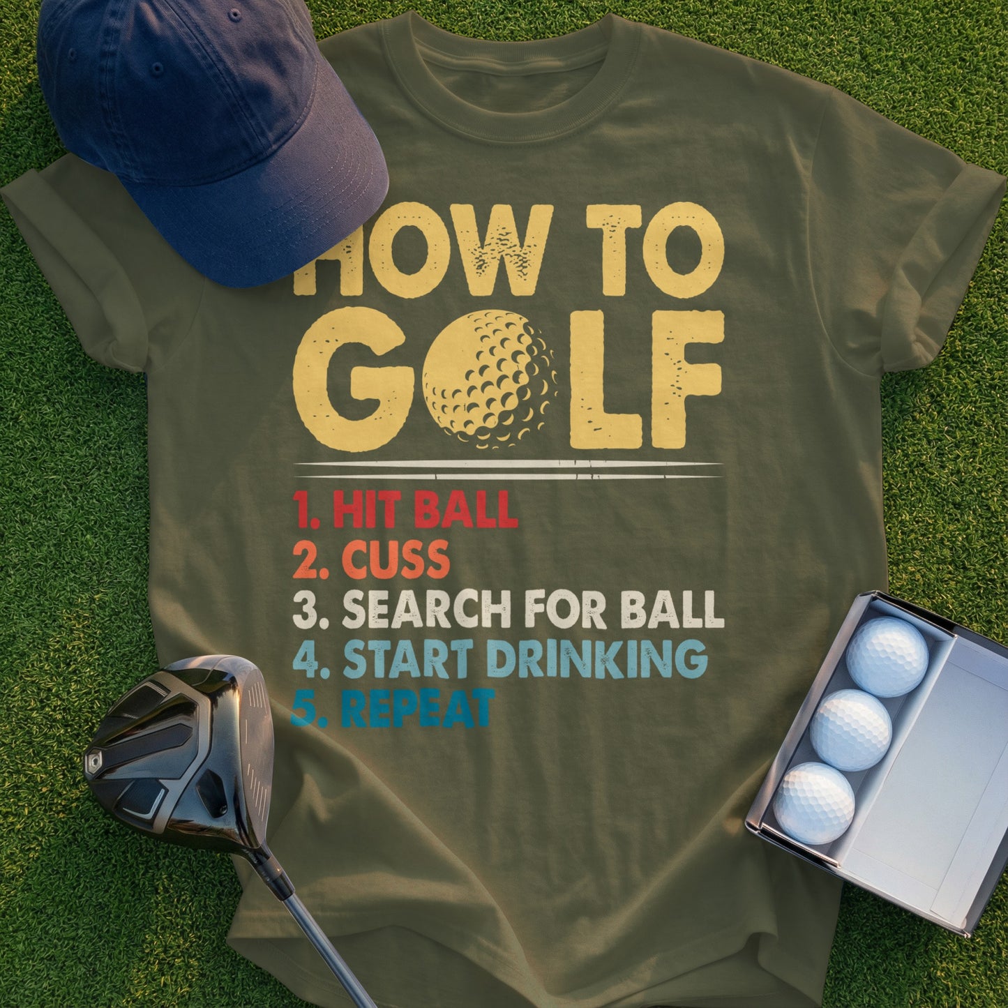 Olive green t-shirt with "How to Golf" text and humorous instructions.