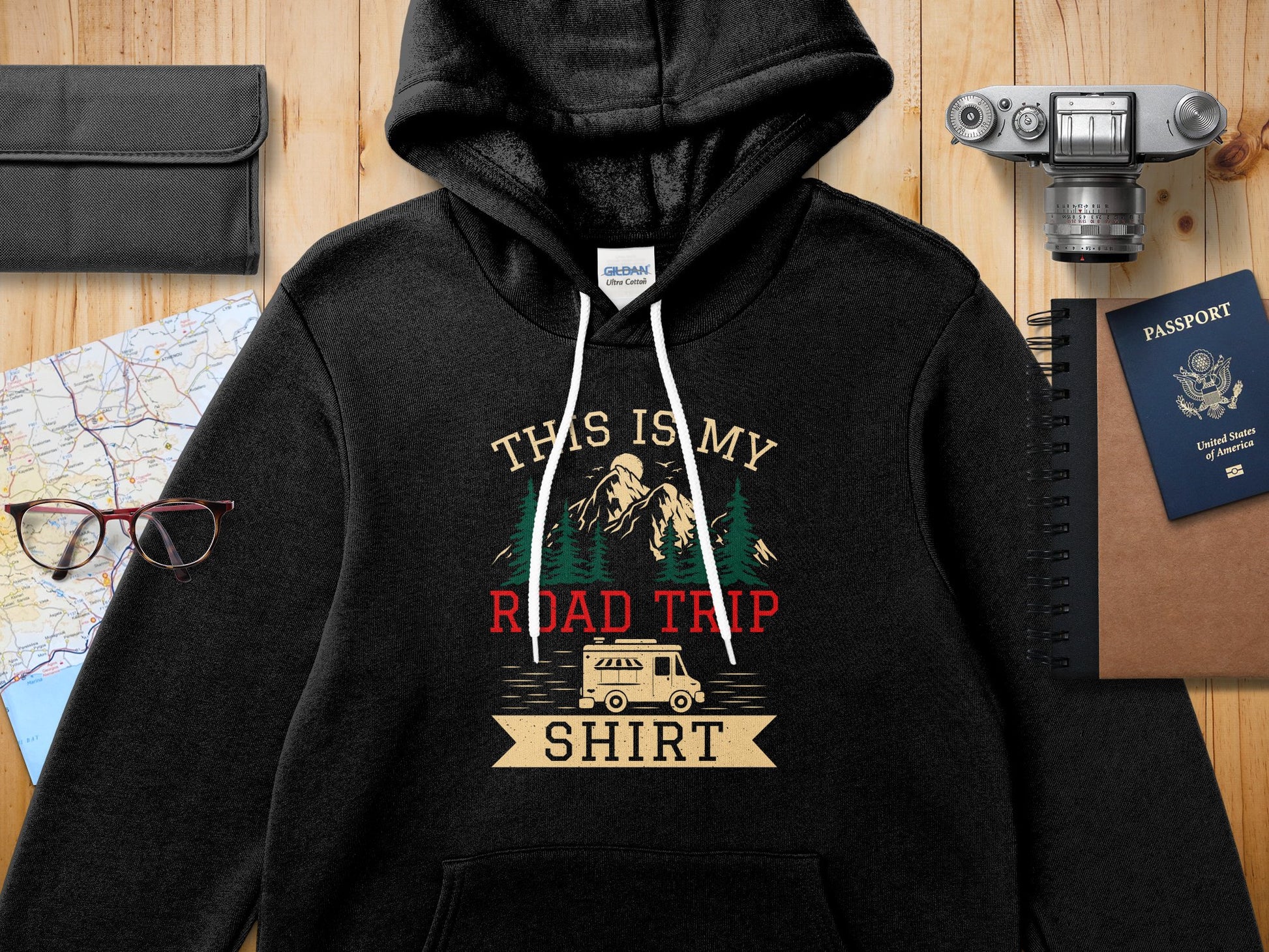 Black Gildan hoodie with "This is My Road Trip Shirt" graphic.