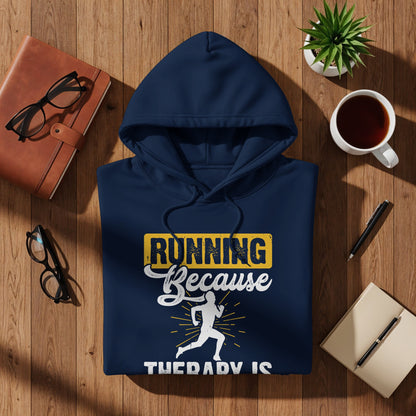 Navy hoodie with "Running Because Therapy Is" graphic and running silhouette.
