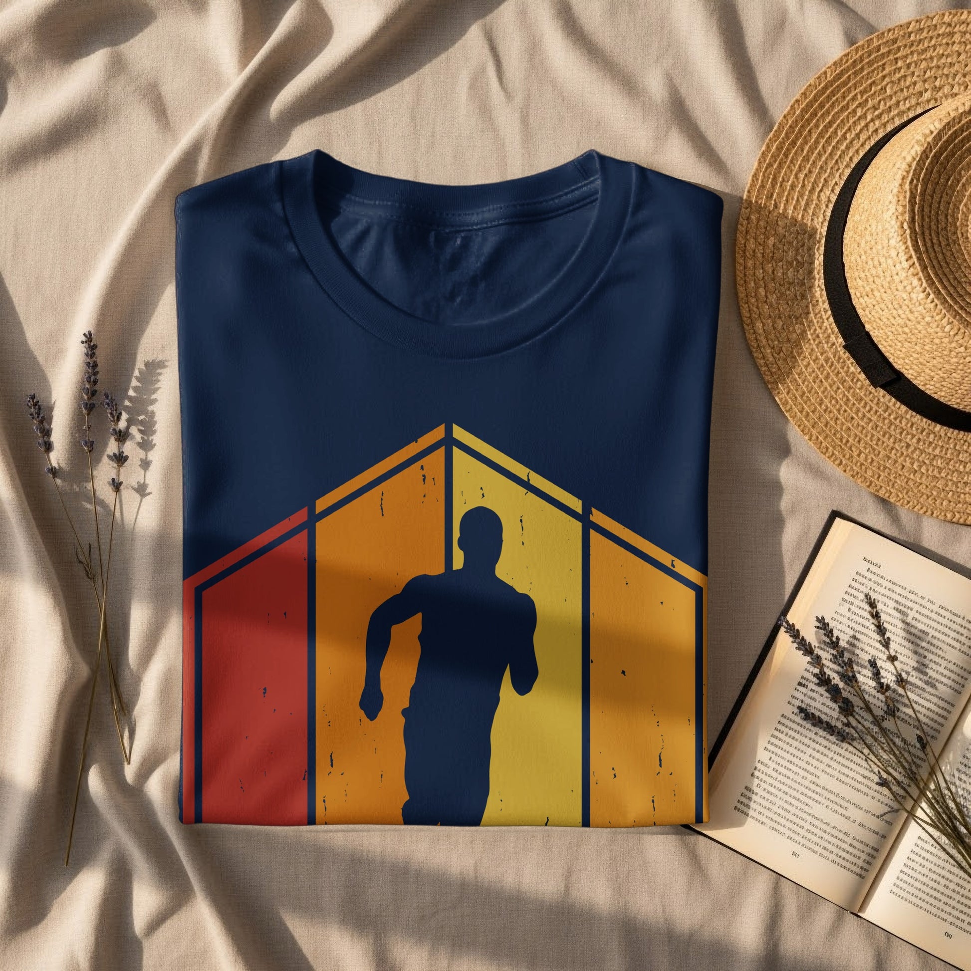 Navy t-shirt with runner silhouette against a geometric sunset design.