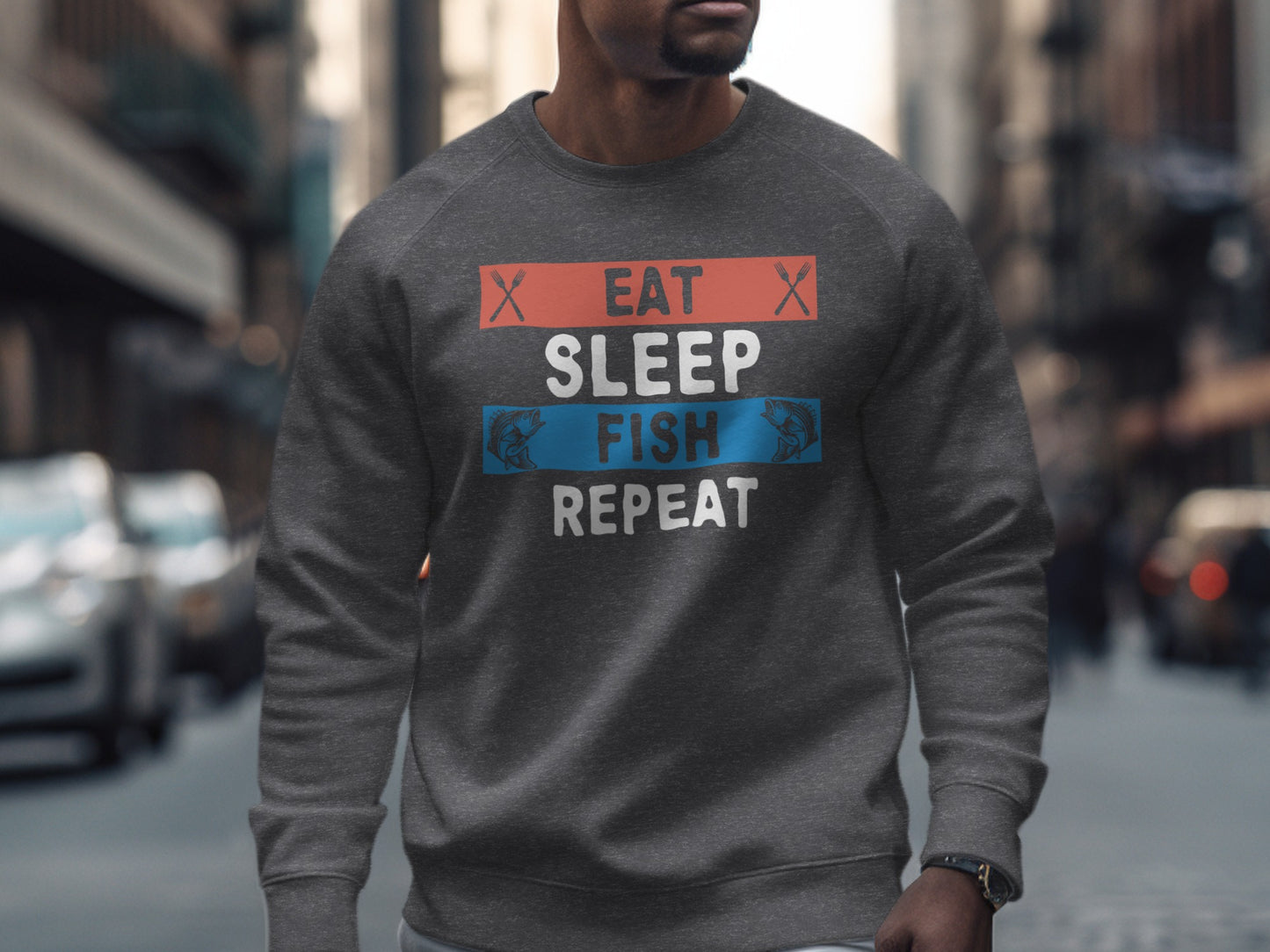 Dark gray crewneck sweatshirt with "Eat Sleep Fish Repeat" text graphic.