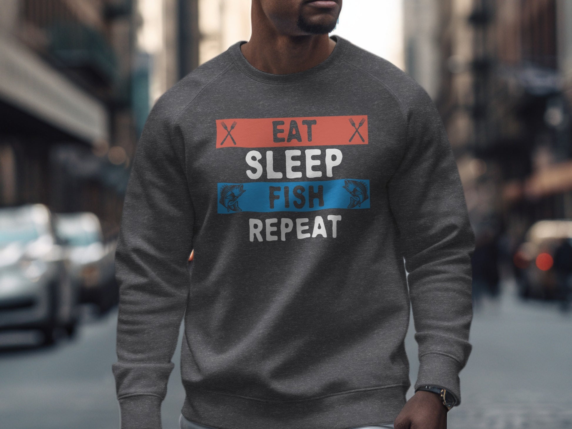 Dark gray crewneck sweatshirt with "Eat Sleep Fish Repeat" text graphic.