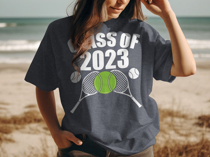 Navy t-shirt with "CLASS of 2023" and tennis rackets and balls.