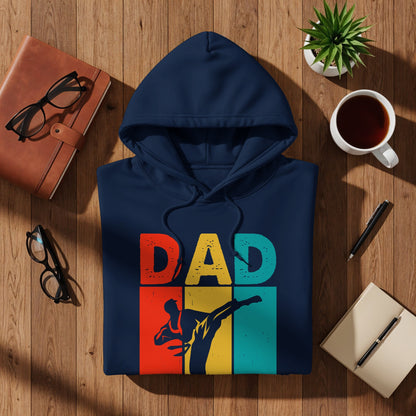 Navy blue hoodie with "DAD" text and a martial artist silhouette.
