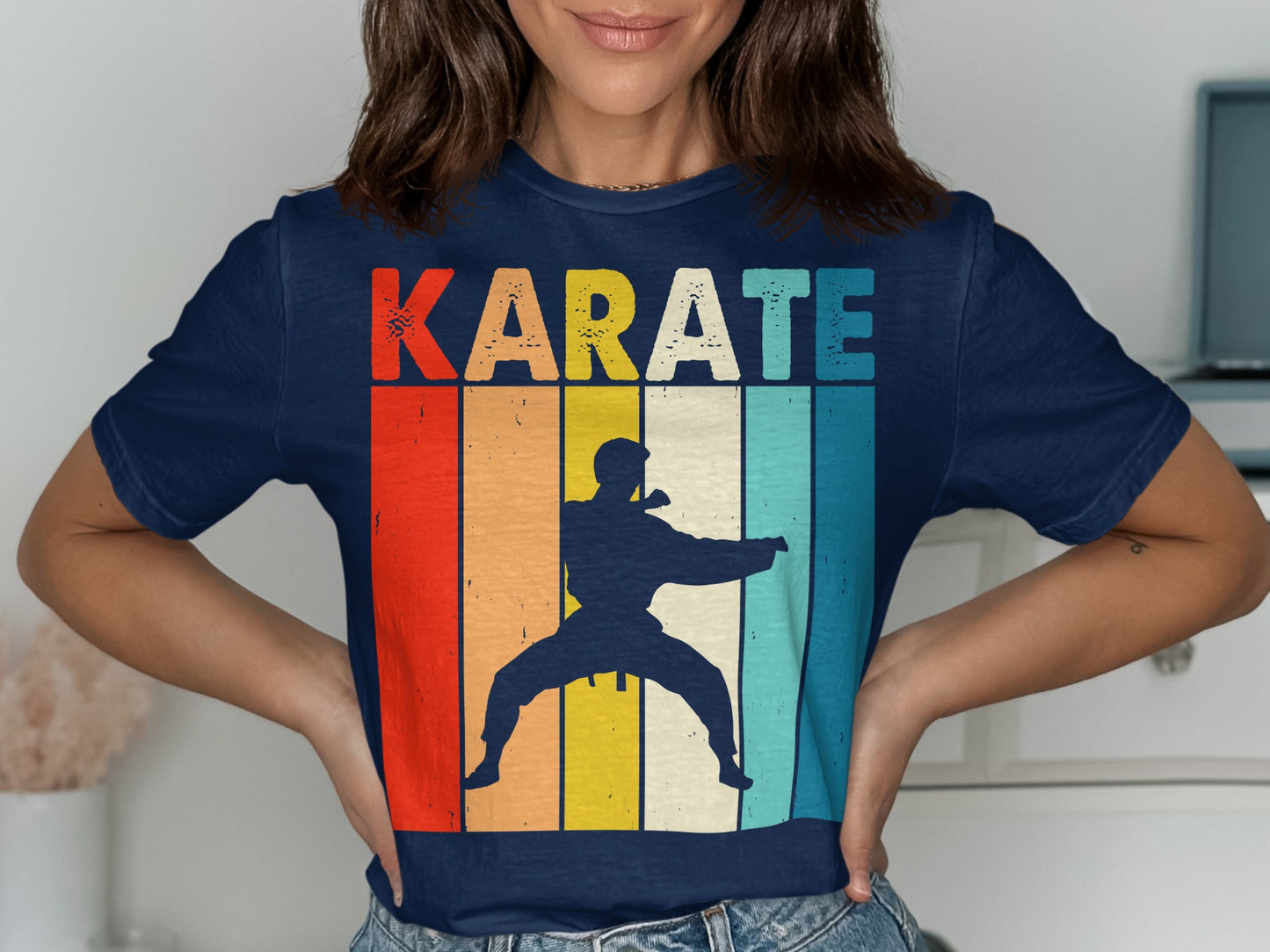 Navy t-shirt with "KARATE" in retro colorful stripes and a silhouette.