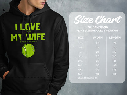 Black hoodie with "I Love My Wife... Lets Me Play Tennis" graphic and size chart.