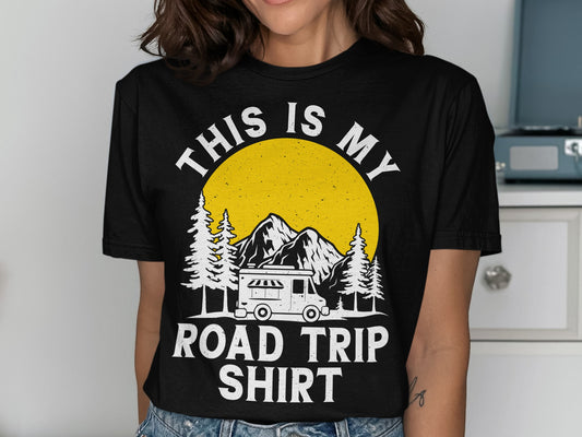 Black t-shirt with white text "THIS IS MY ROAD TRIP SHIRT" and a graphic.