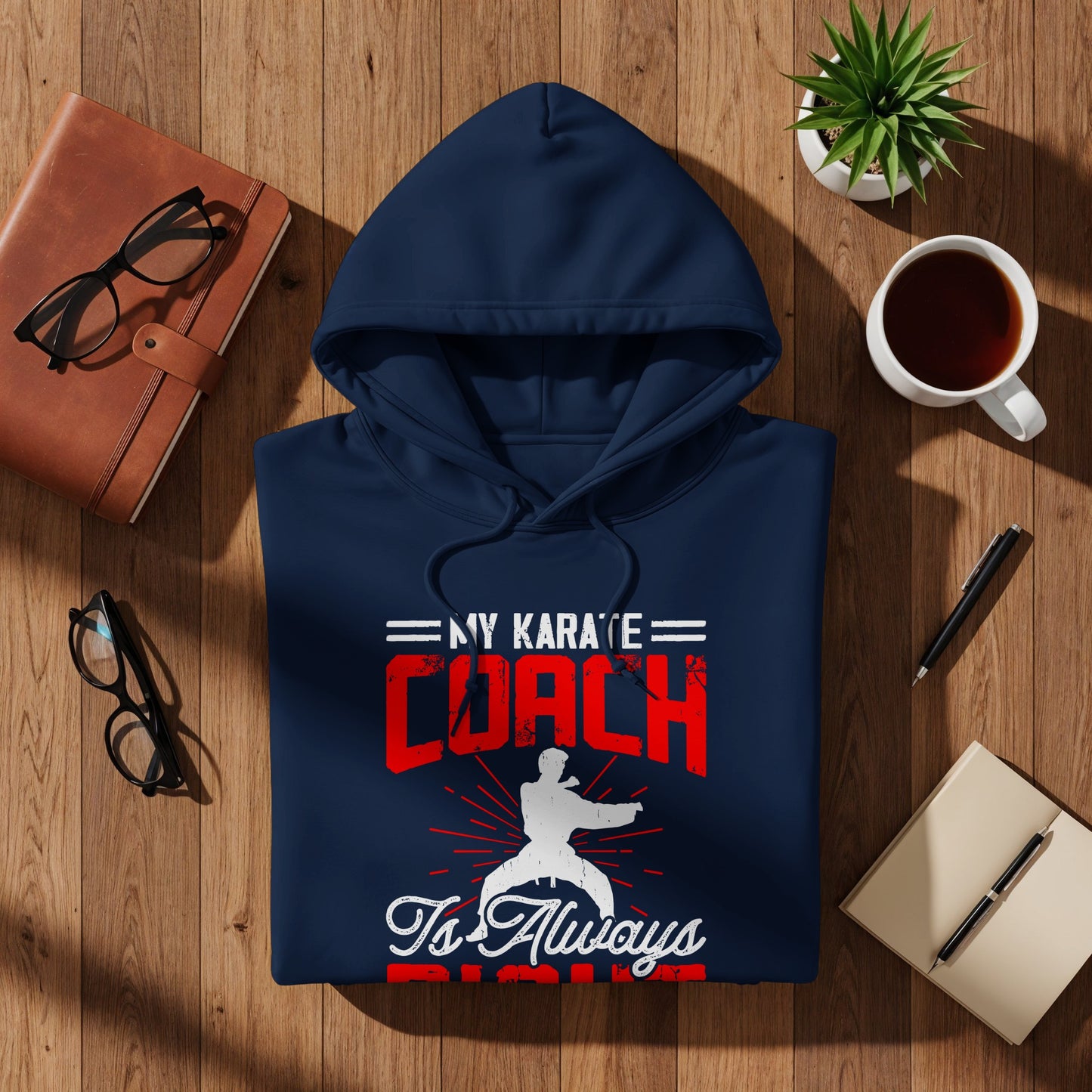 Navy hoodie with "My Karate Coach is Always Right" text.