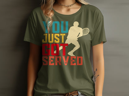 Green t-shirt with vintage tennis player graphic and text "YOU JUST GOT SERVED".