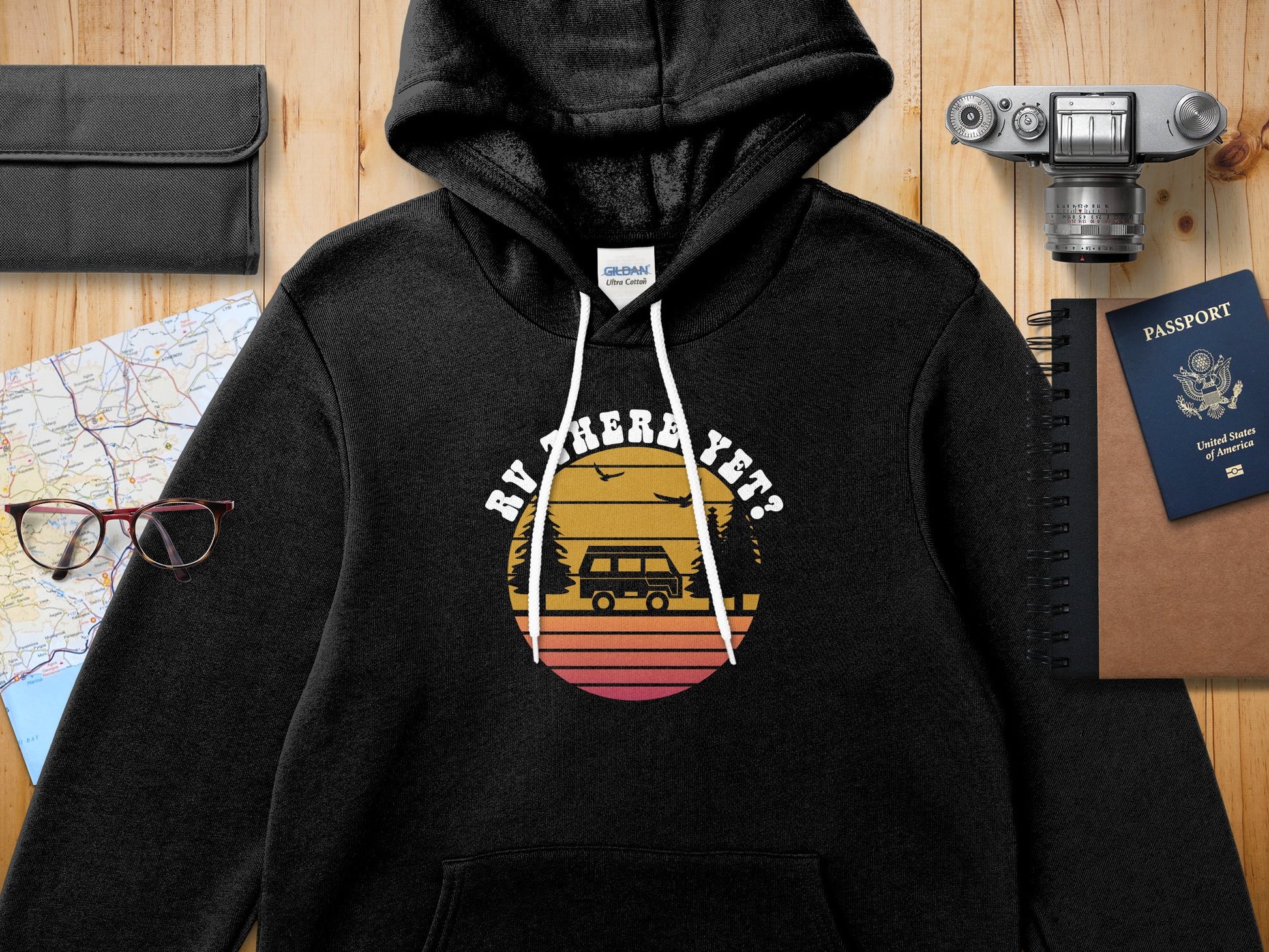 Black RV There Yet hoodie with sunset and camper van graphic.