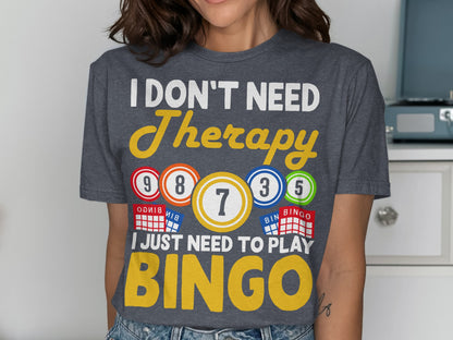 Dark grey t-shirt with "I DON'T NEED Therapy BINGO" text and bingo balls.