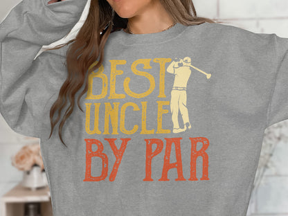 Grey sweatshirt with "BEST UNCLE BY PAR" text and golfer graphic.