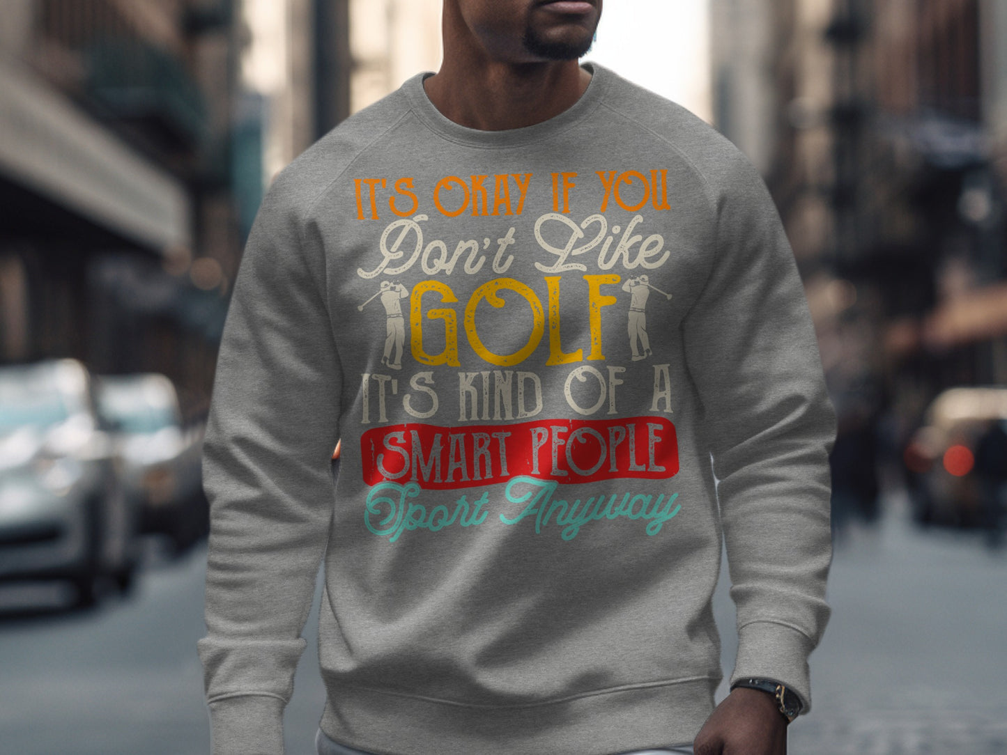 Grey sweatshirt with "It's Only If You Don't Like Golf It's Kind of a Smart People Sport Anyway" text.