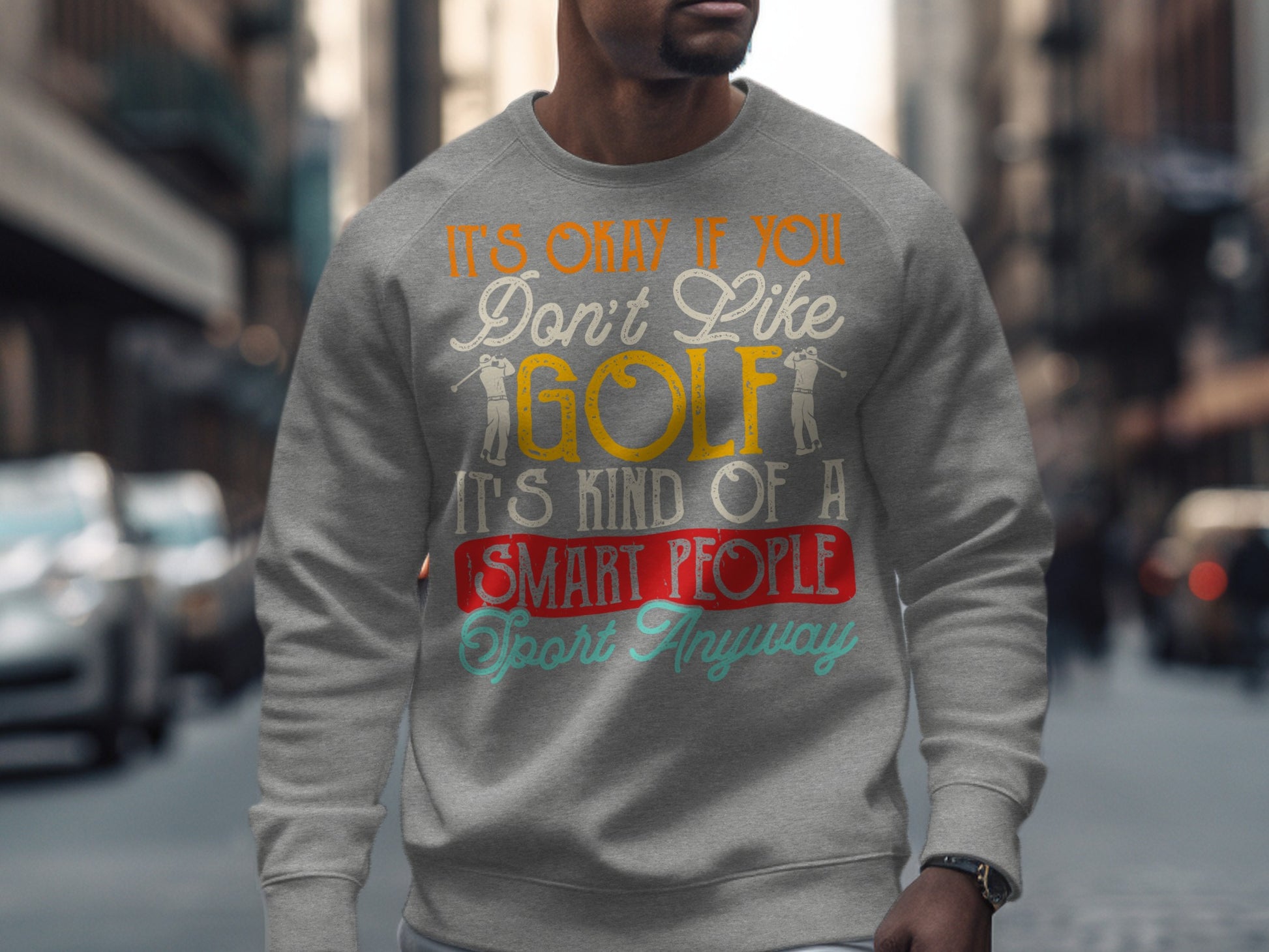 Grey sweatshirt with "It's Only If You Don't Like Golf It's Kind of a Smart People Sport Anyway" text.