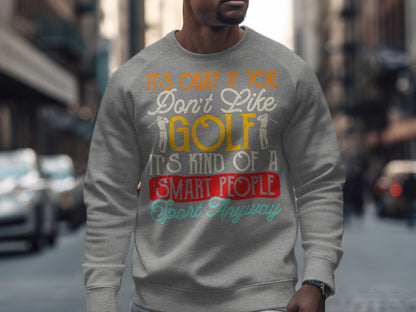 Grey sweatshirt with "It's Only If You Don't Like Golf It's Kind of a Smart People Sport Anyway" text.