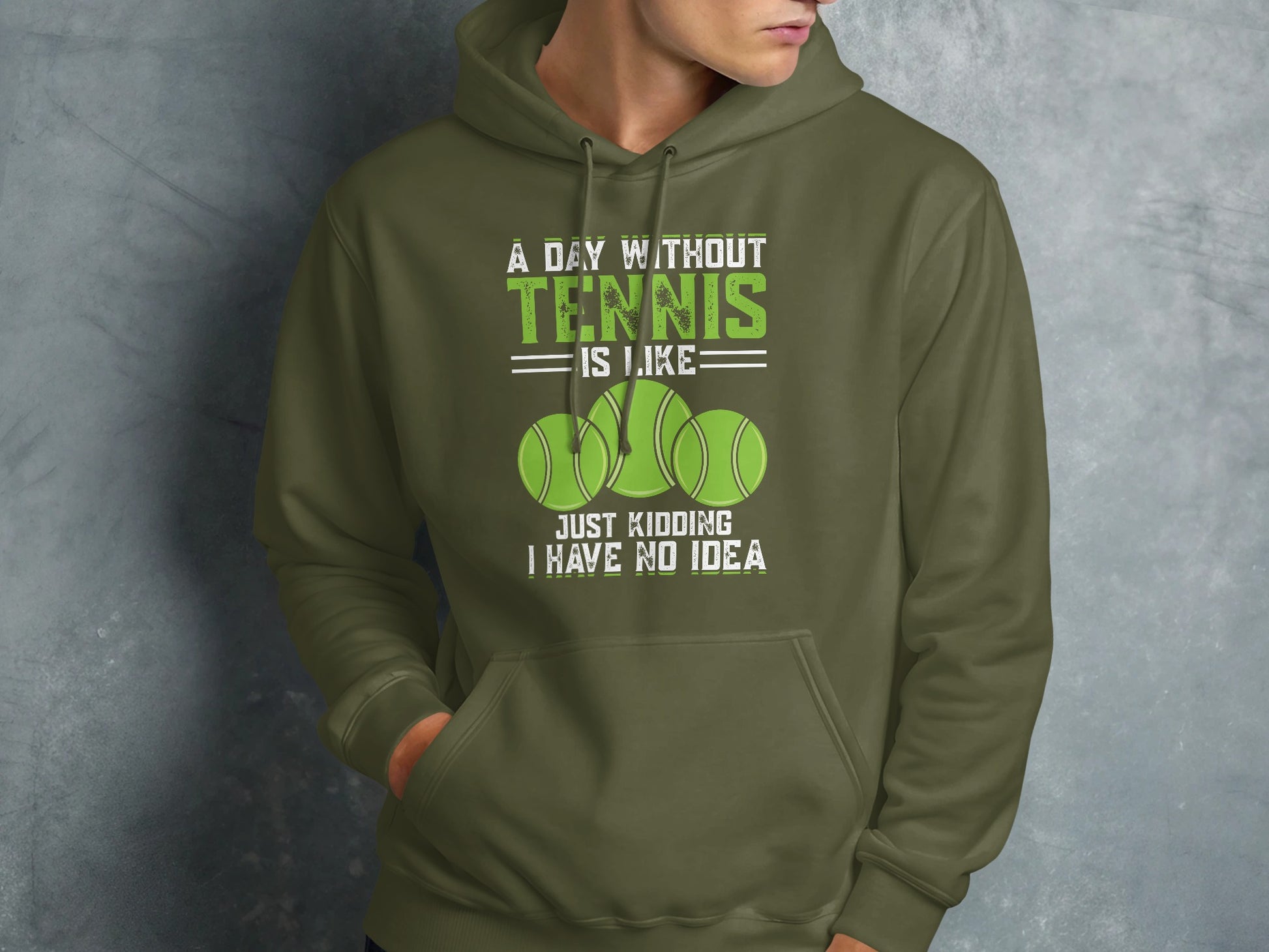 Green hoodie with "A day without tennis is like... just kidding I have no idea" text.