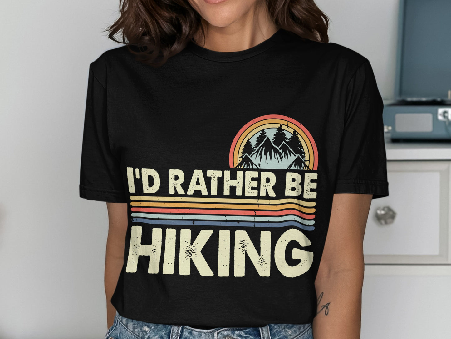 Black t-shirt with "I'd Rather Be Hiking" text and a mountain landscape design.