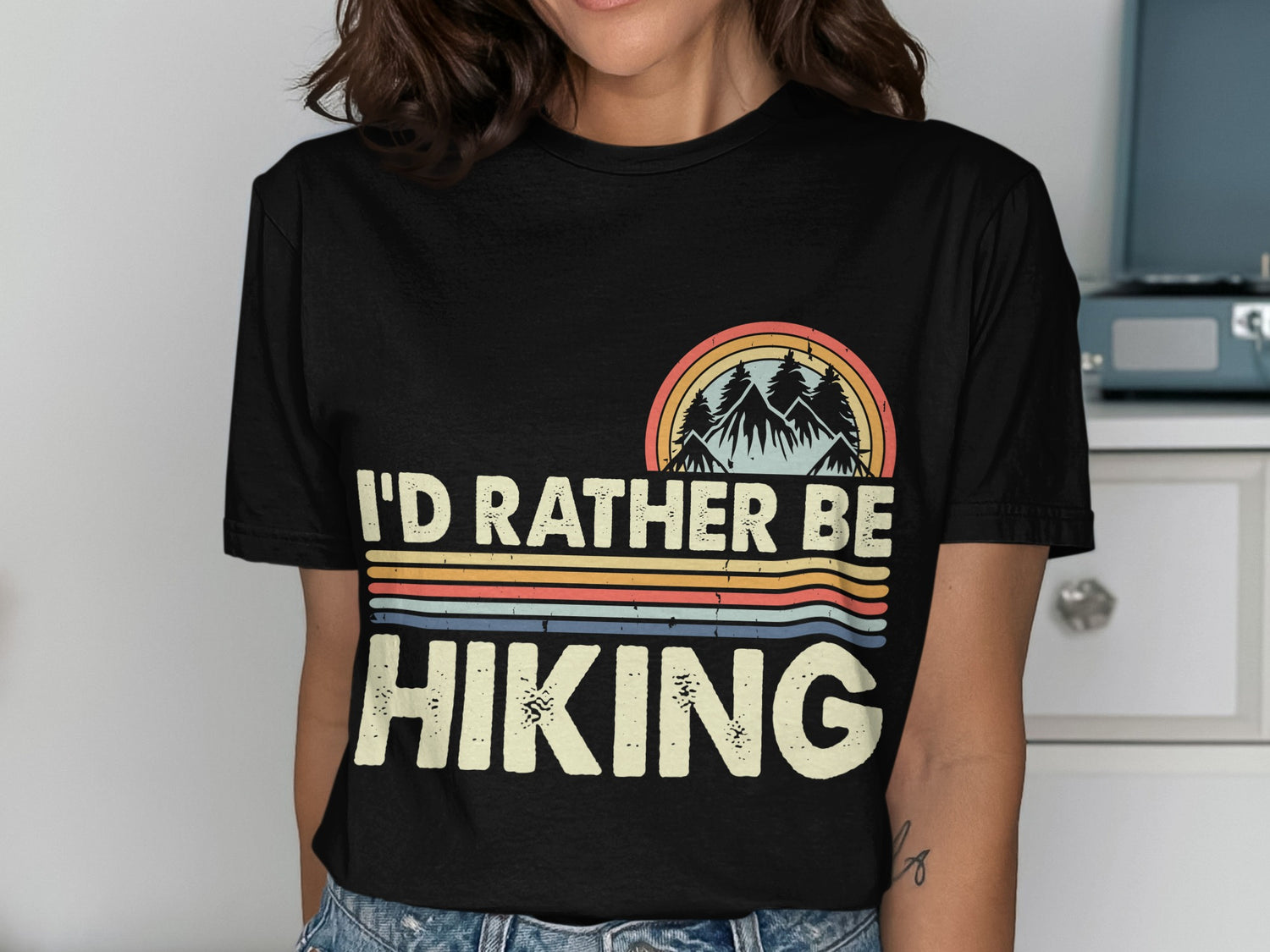 Black t-shirt with "I'd Rather Be Hiking" text and a mountain landscape design.