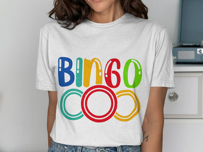 White t-shirt with "BINGO" in colorful letters and two red circles below.