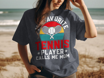 T-shirt with "My Favorite Tennis Player Calls Me Mom" and tennis graphic.